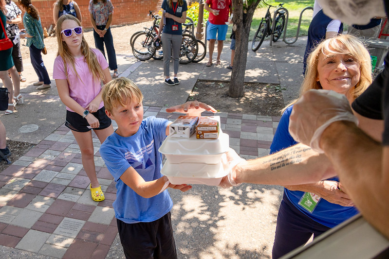 Boy gets a free lunch during the summer meals program in Loveland in 2024.