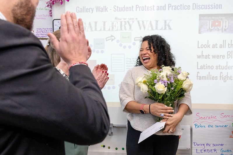 2025 Teacher of the Year Janet Damon receives flowers upon learning she is a finalist for the National Teacher of the Year.