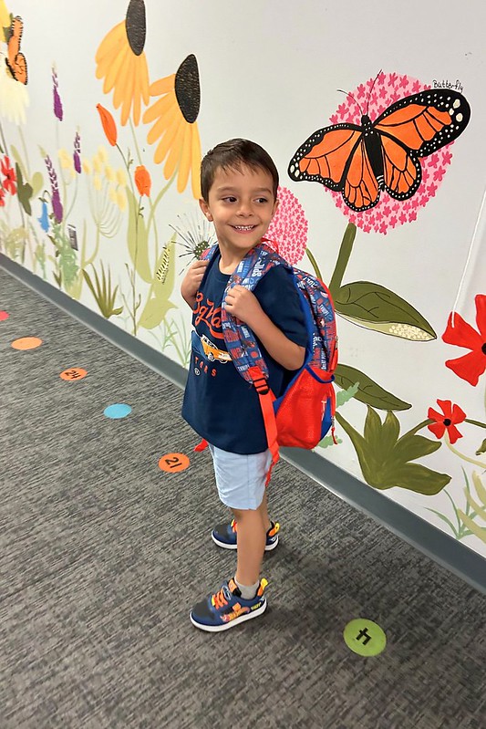 Student with backpack on first day of school.