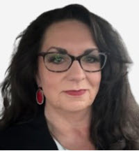 Picture of a white woman with dark brown hair, glasses, and a white background