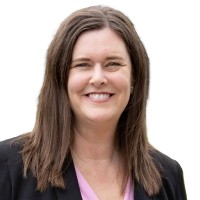 White woman with brown hair and white background